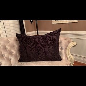 Black oversized pillow with designs